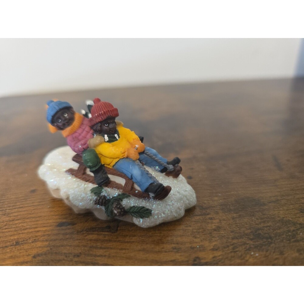 O'Well children sledding Christmas Village Figurine